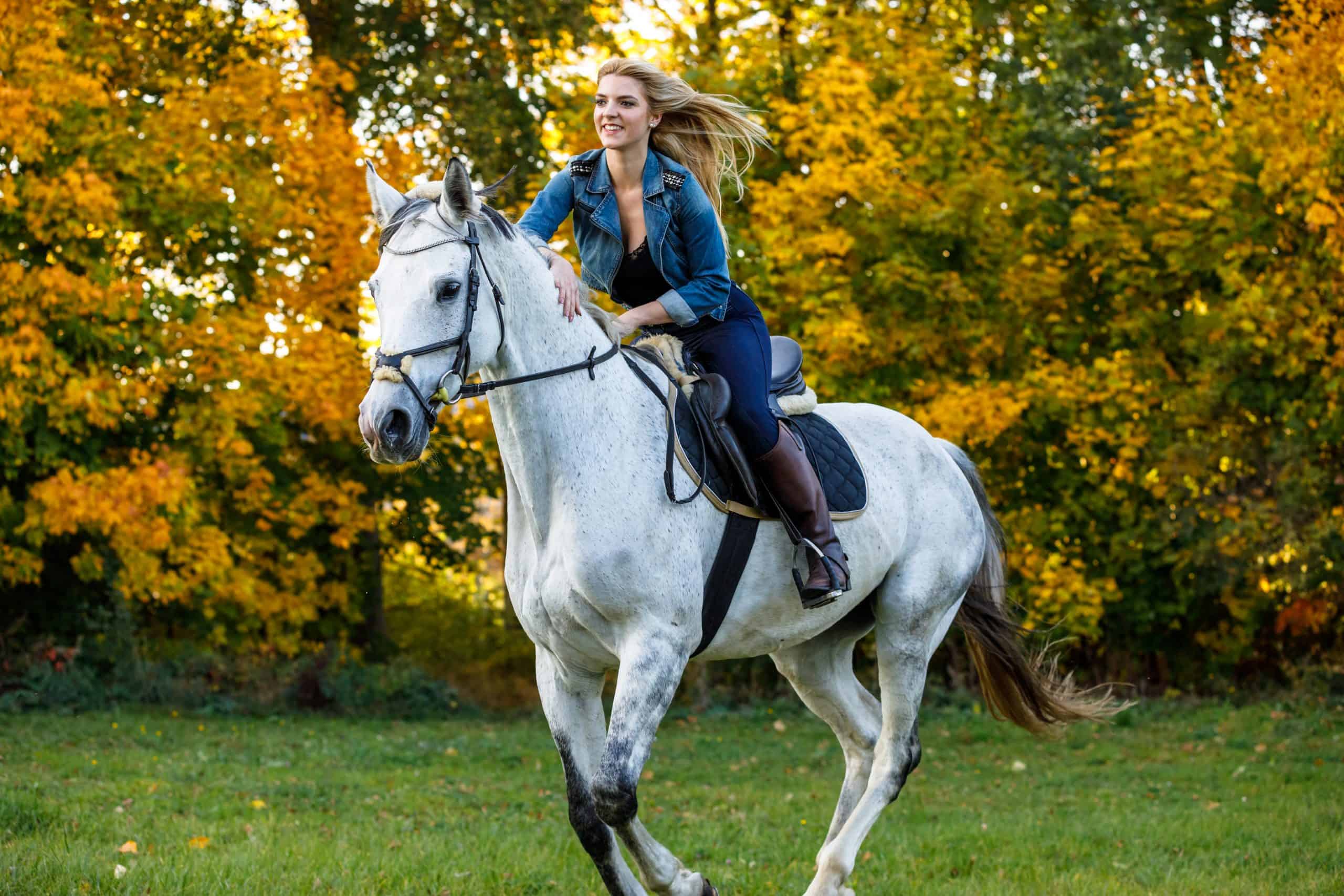 Woman riding a horse in park