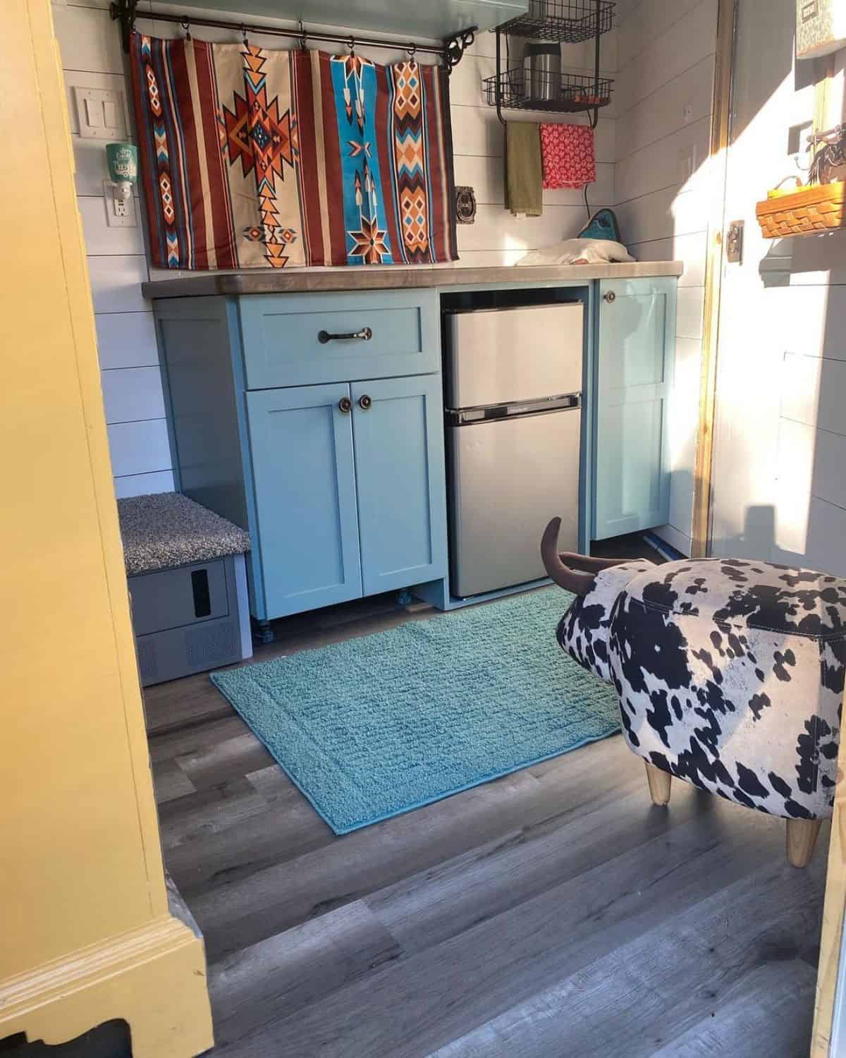 An interior of a cozy horse trailer.