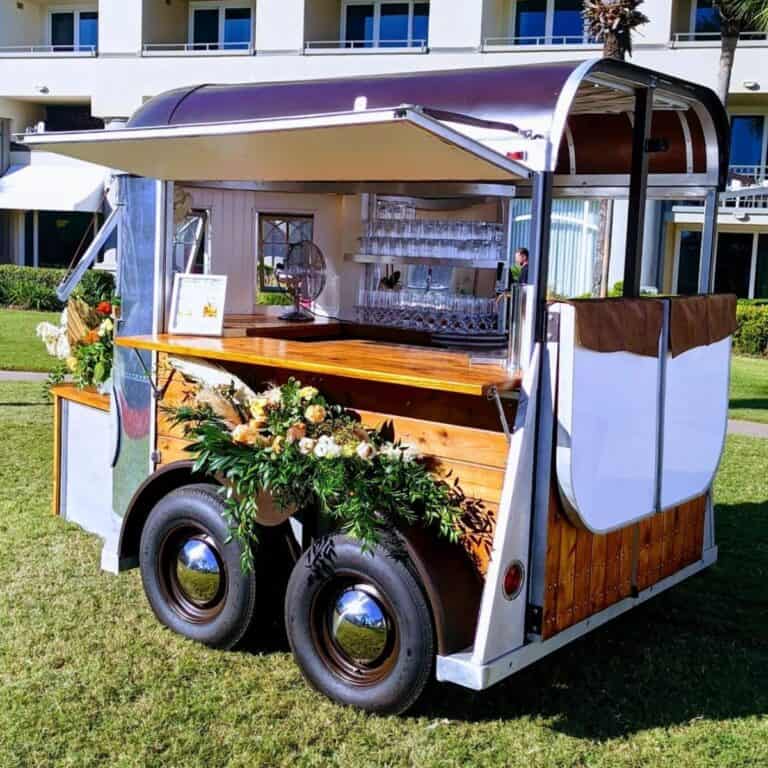A rustic horse trailer rebuilded as a small bar.