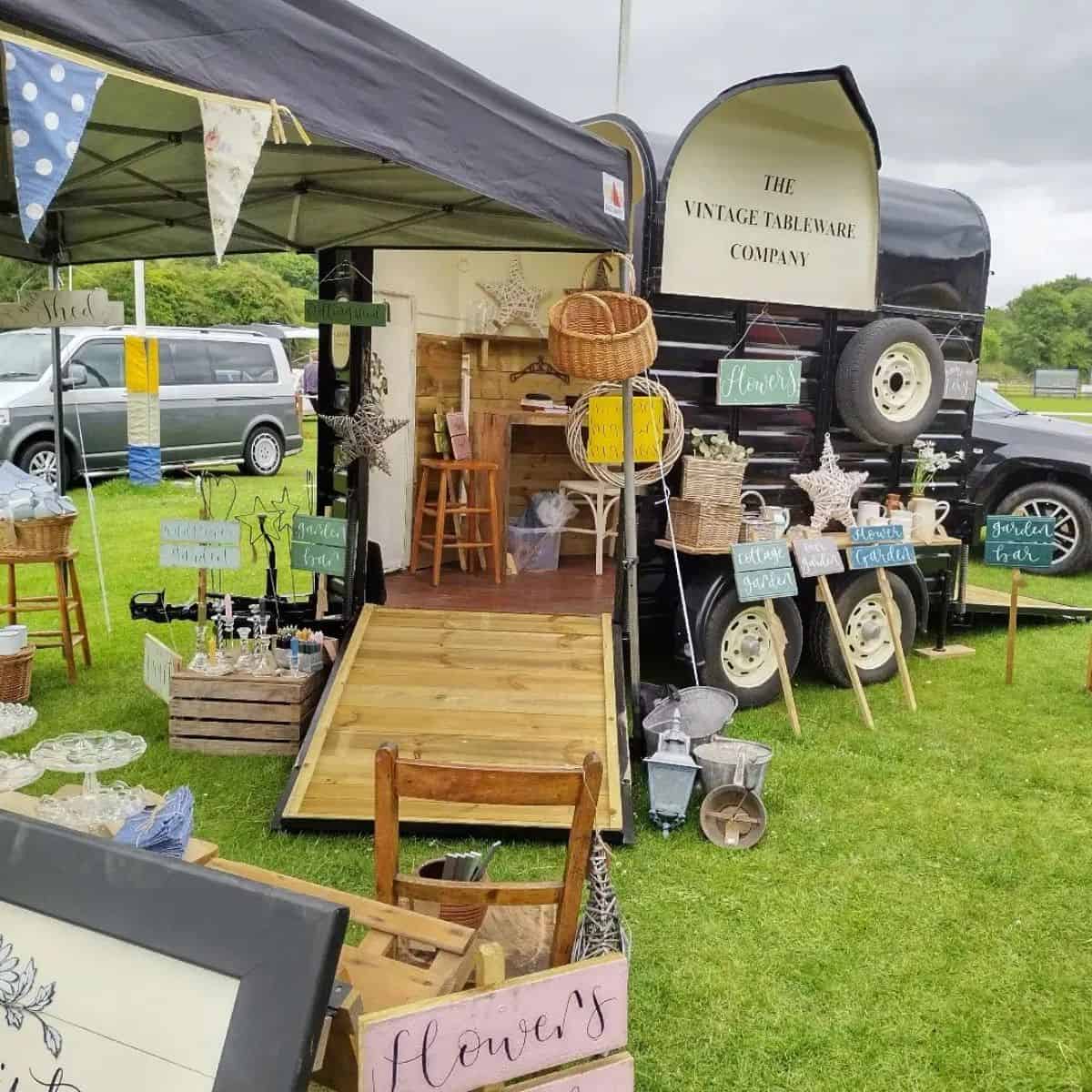 A brown horse trailer rebuilder as a small market shop.