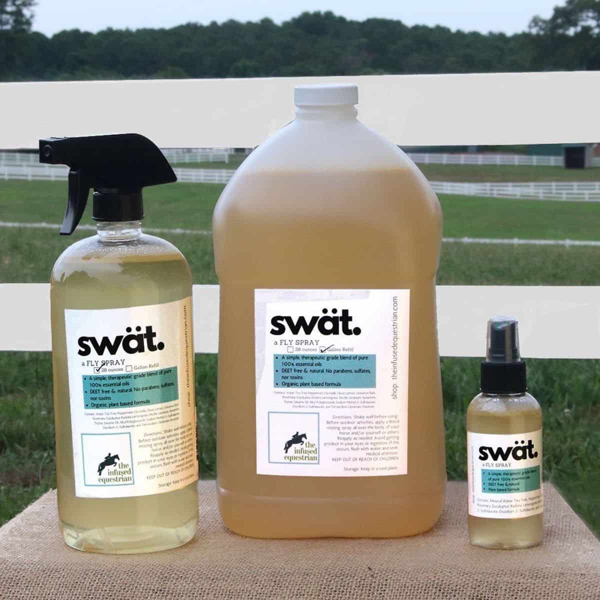 Fly spray in three different containers.