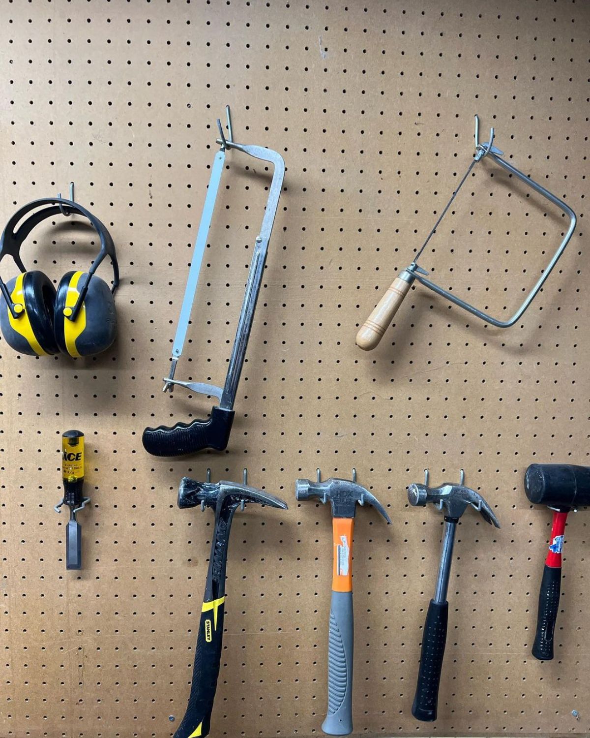 Pegboard with different tools.