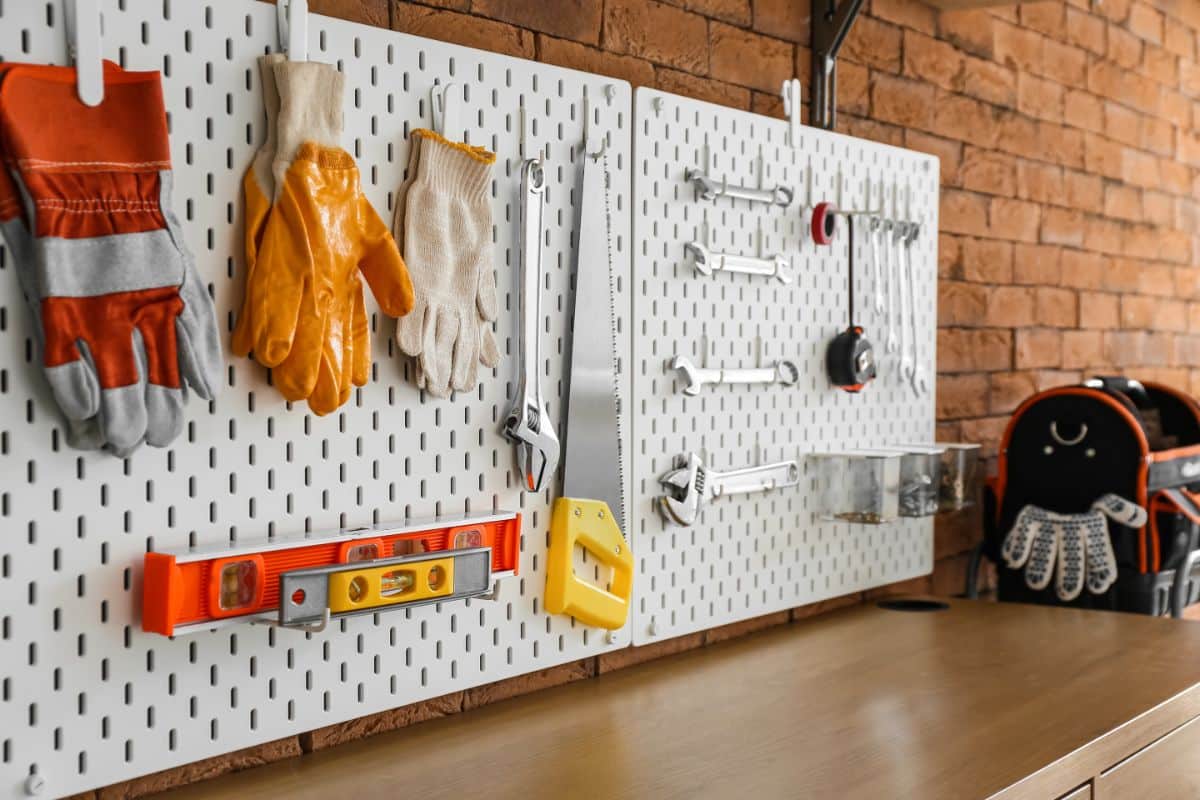 Pegboard with mounted tools.