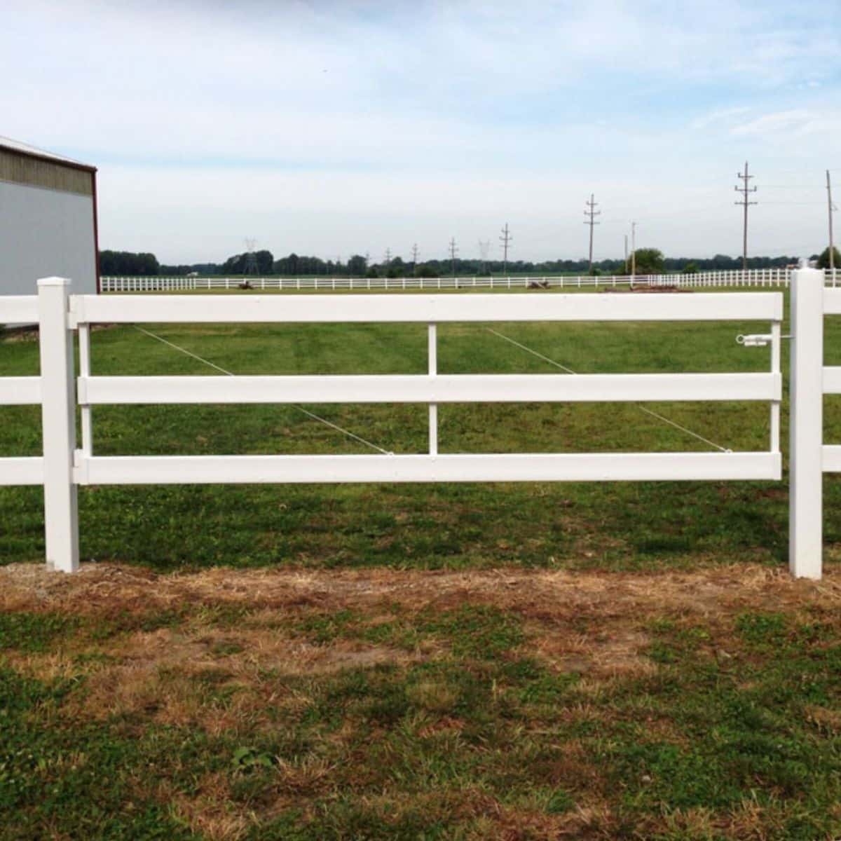 High-Density Polyethylene white fence on a ranch.